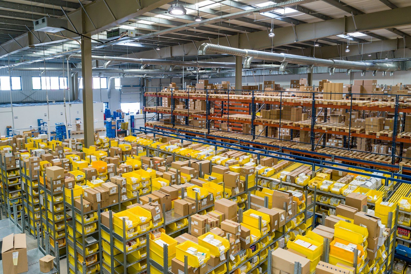 Overview of a distribution warehouse with sorted stock bins